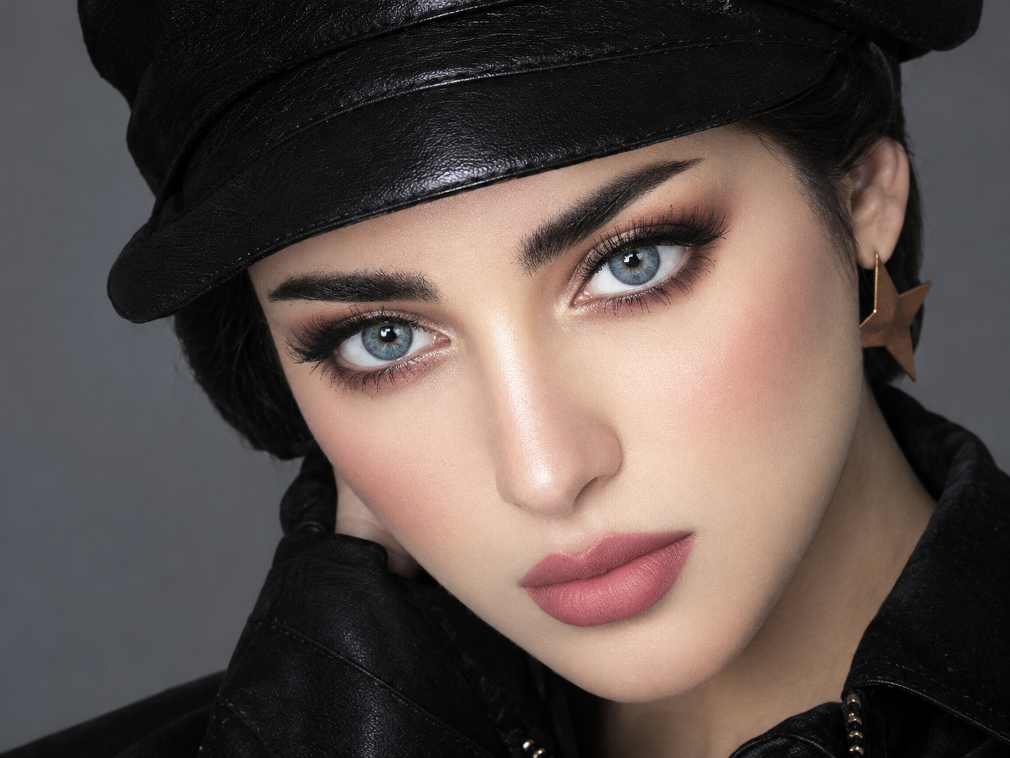 Glamorous Portrait in a Leather Cap
